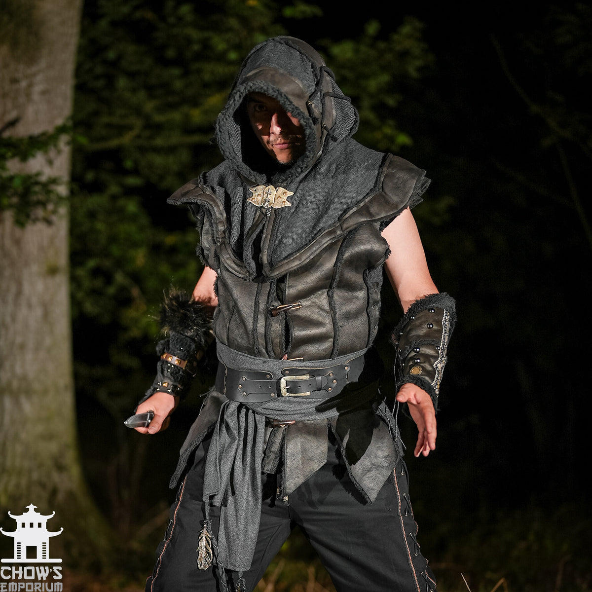 LARP medieval demon hunter set in dark tones, close-up of hood, waistcoat.