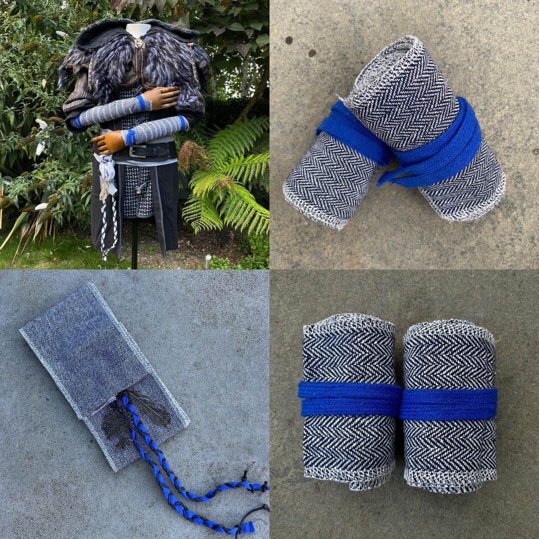 Medieval LARP mannequin in fur cloak and decorative blue wool sash.