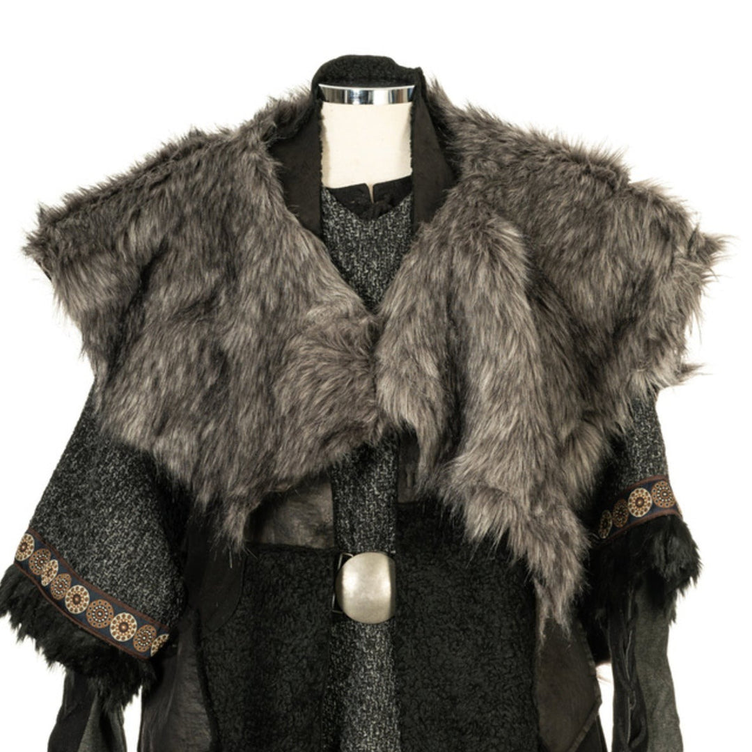 Medieval LARP costume with fur mantle, detailed sleeve embroidery.