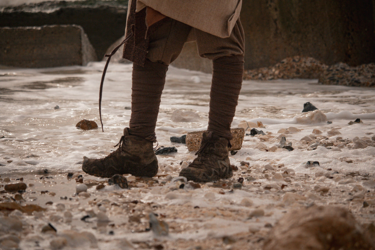 Brown herringbone wool leg wraps on beach, LARP medieval style.