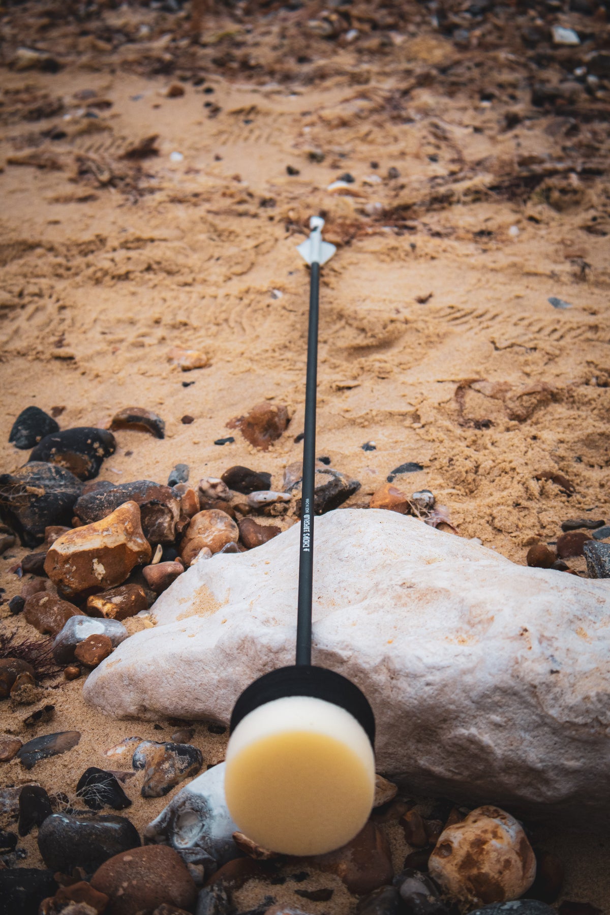 black arrow with foam head head on the beach for LARP.