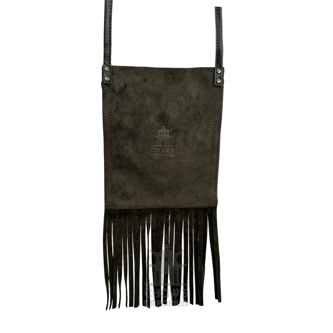 Green suede fringe flap bag showing fringe and long strap