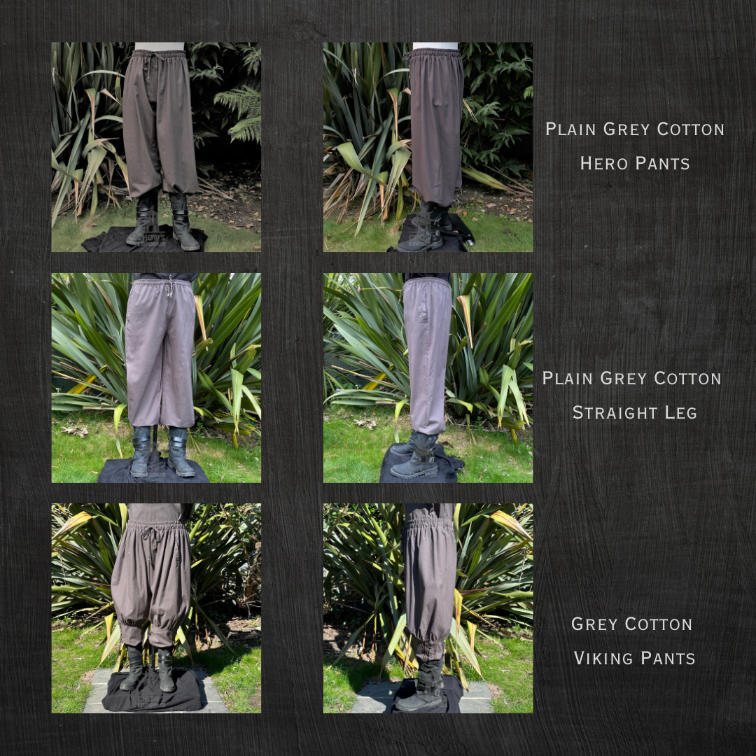 Grey medieval hero pants, front view with boots, lush greenery.