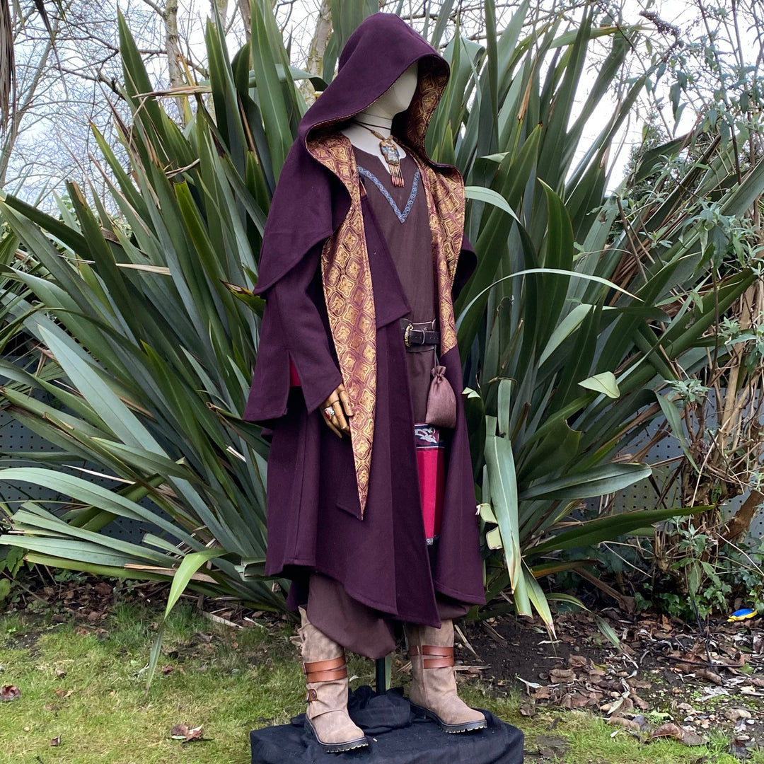 Side view of dark red three-layered medieval LARP cloak with gold lining, fantasy cosplay.