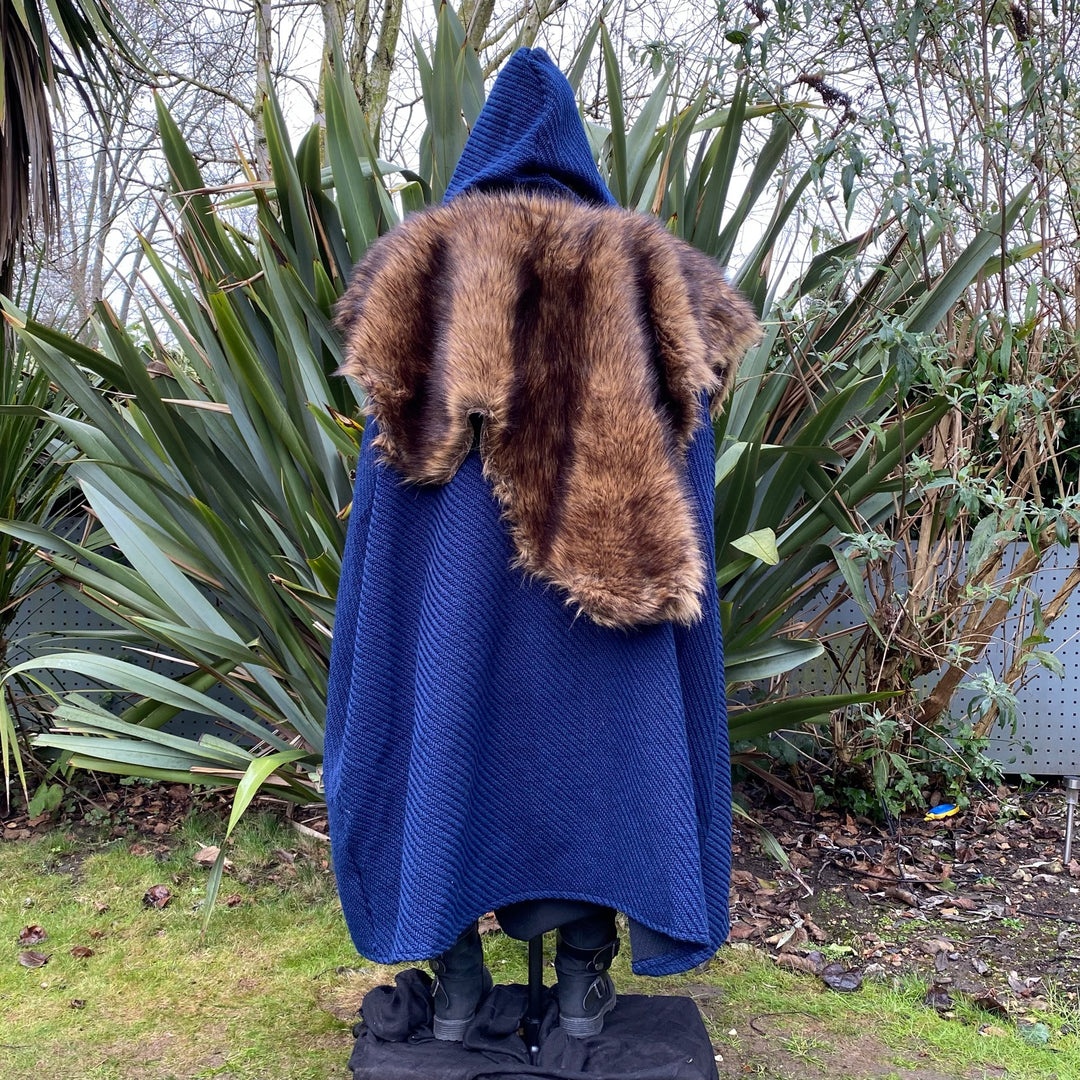 Back view of faux fur mantle on blue cloak for medieval LARP.