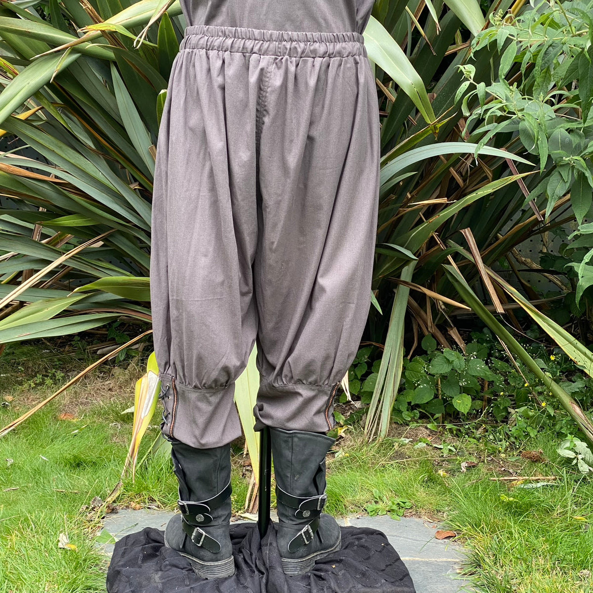 roleplay trousers in grey cotton with lacing and braiding.