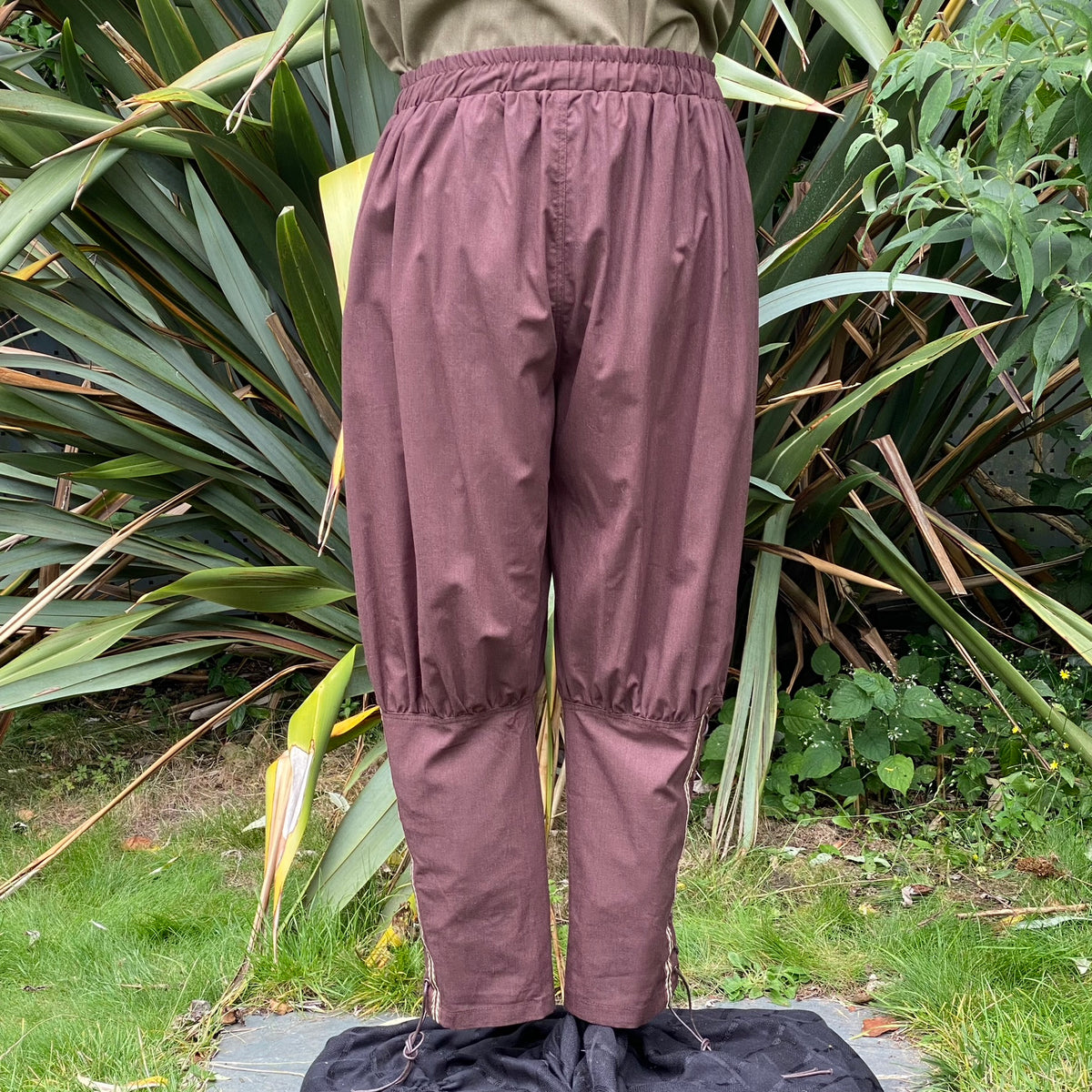 brown cotton trousers with viking braiding for LARP.