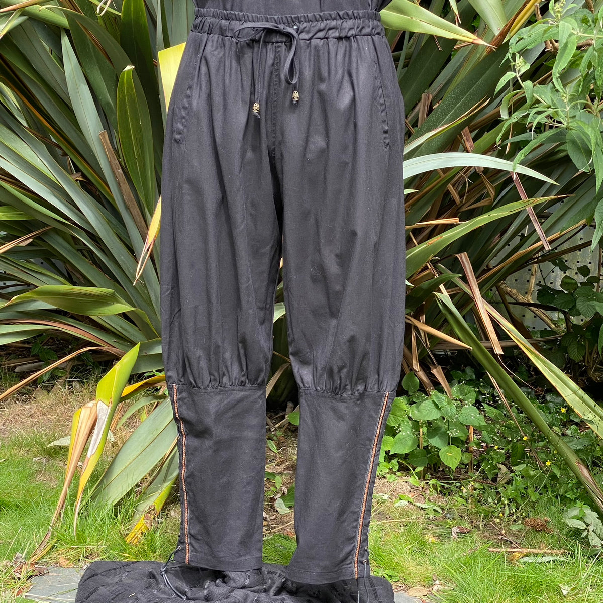 Black medieval-style trousers for LARP, front view, with drawstring waist.