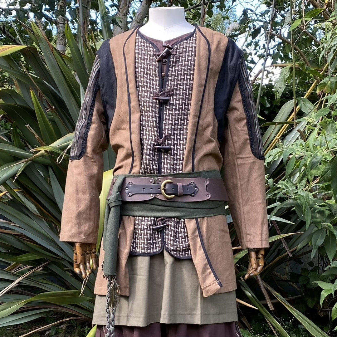 Medieval LARP costume close-up with detailed tunic and belts.