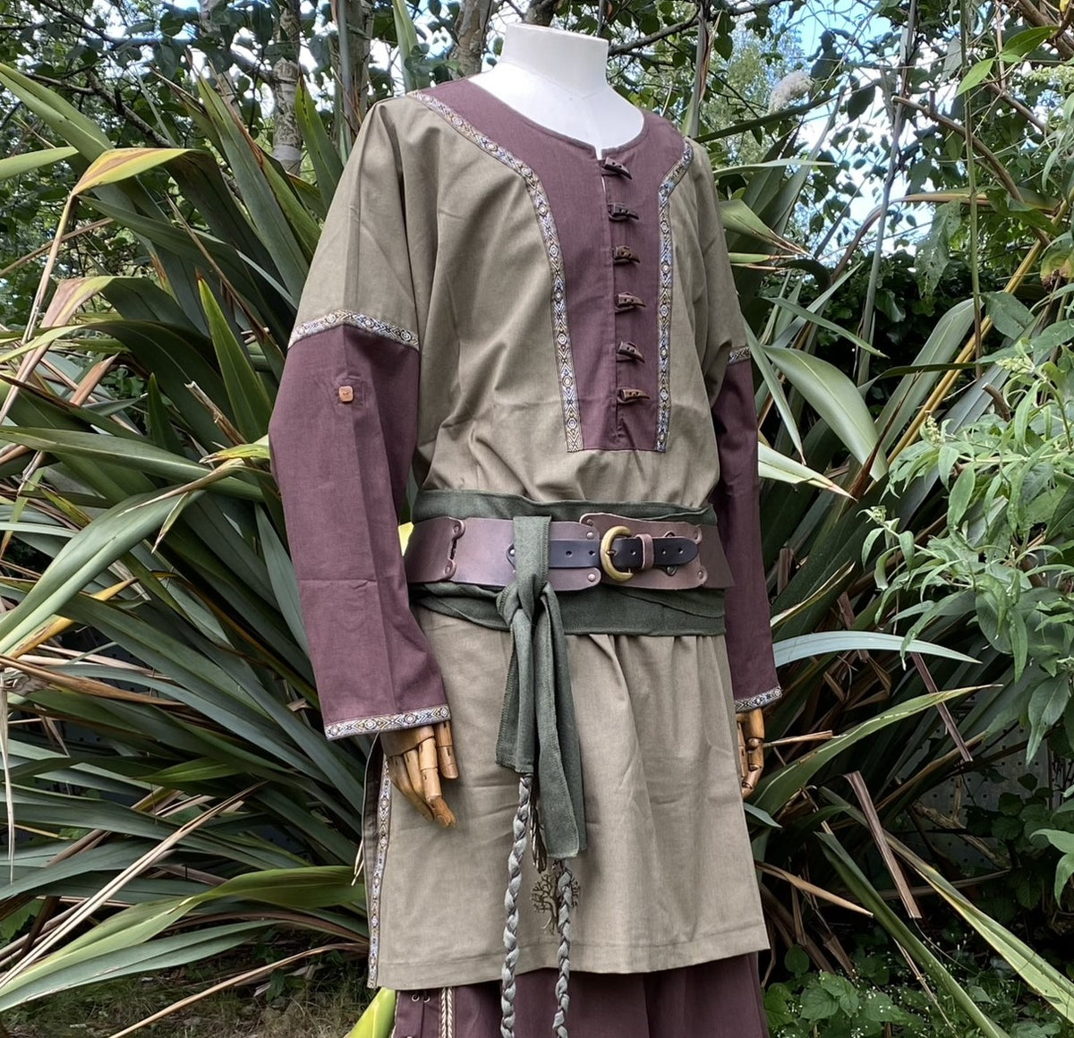 Brown and green LARP tunic close-up in woodland setting with belt detail.