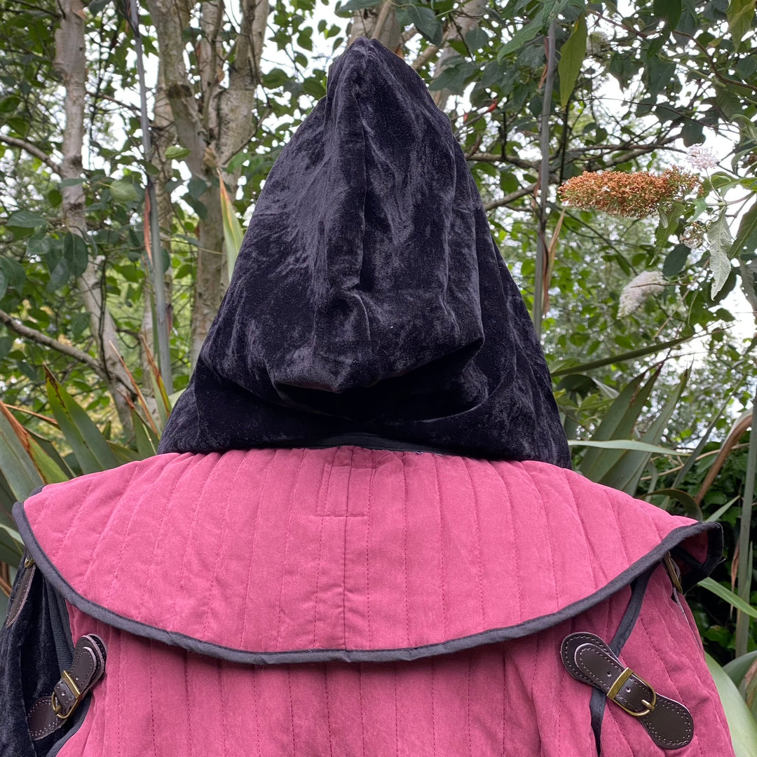 LARP medieval set with black hood and pink jacket, back view.