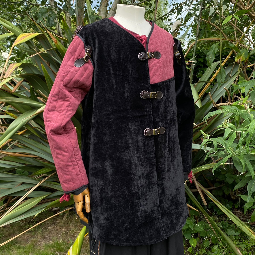 Black and red velvet medieval jacket with buckles.