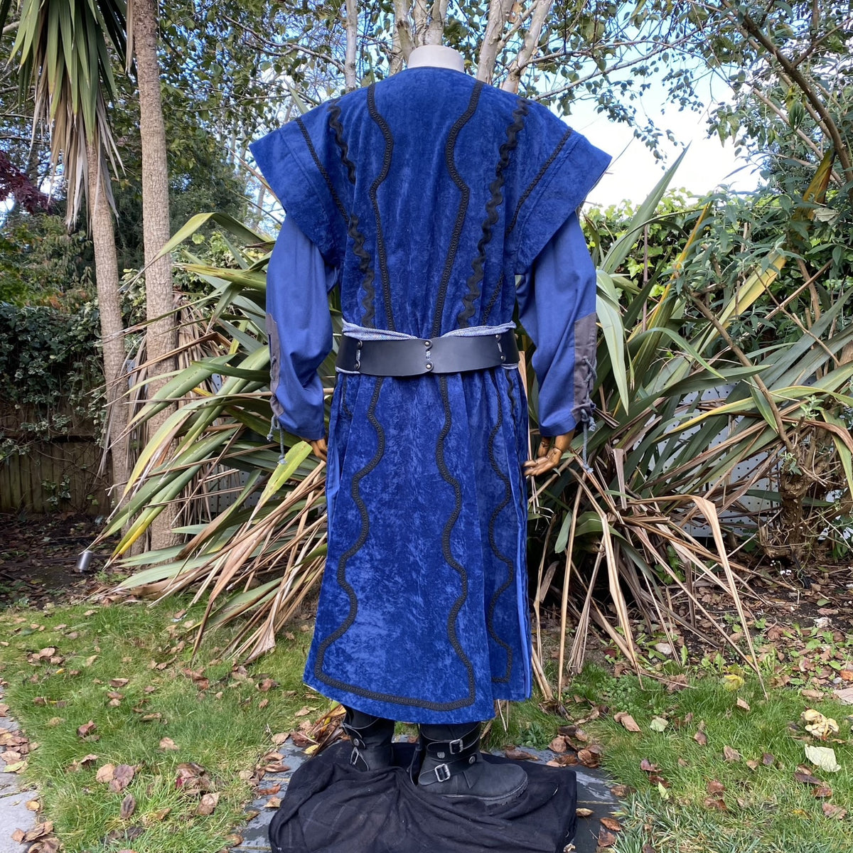 Blue velvet Storm Mage LARP tunic and waistcoat with black belt, back view.