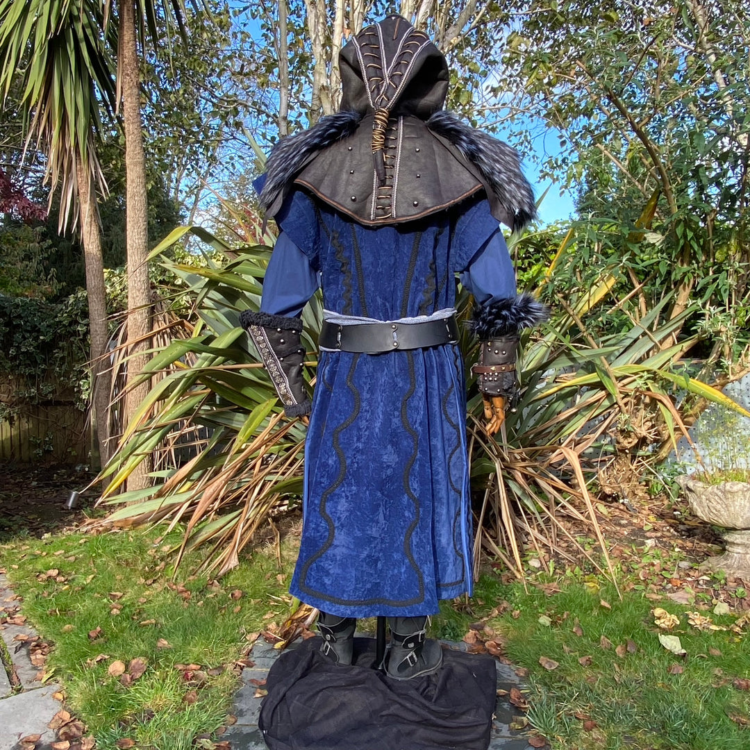 Blue velvet medieval LARP tunic set with black hood and vambraces, rear view.