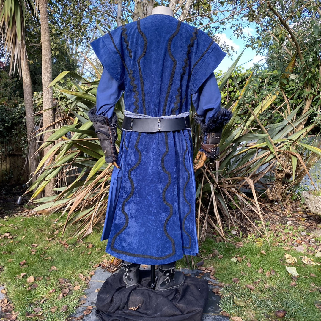 Back view of blue LARP costume with detailed waistcoat and leather vambraces.