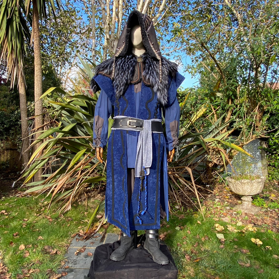 Mannequin in blue medieval LARP outfit with fur-trimmed hood.