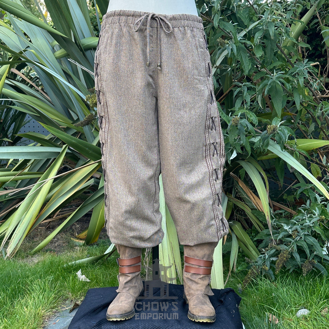 LARP medieval pants in natural fabric, front view, detailed side lacing.