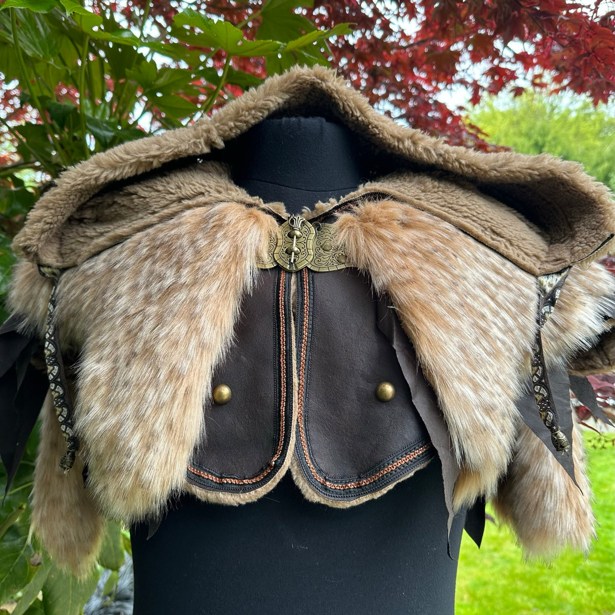 Brown medieval LARP hooded jacket with fur trim, front view, intricate clasp.