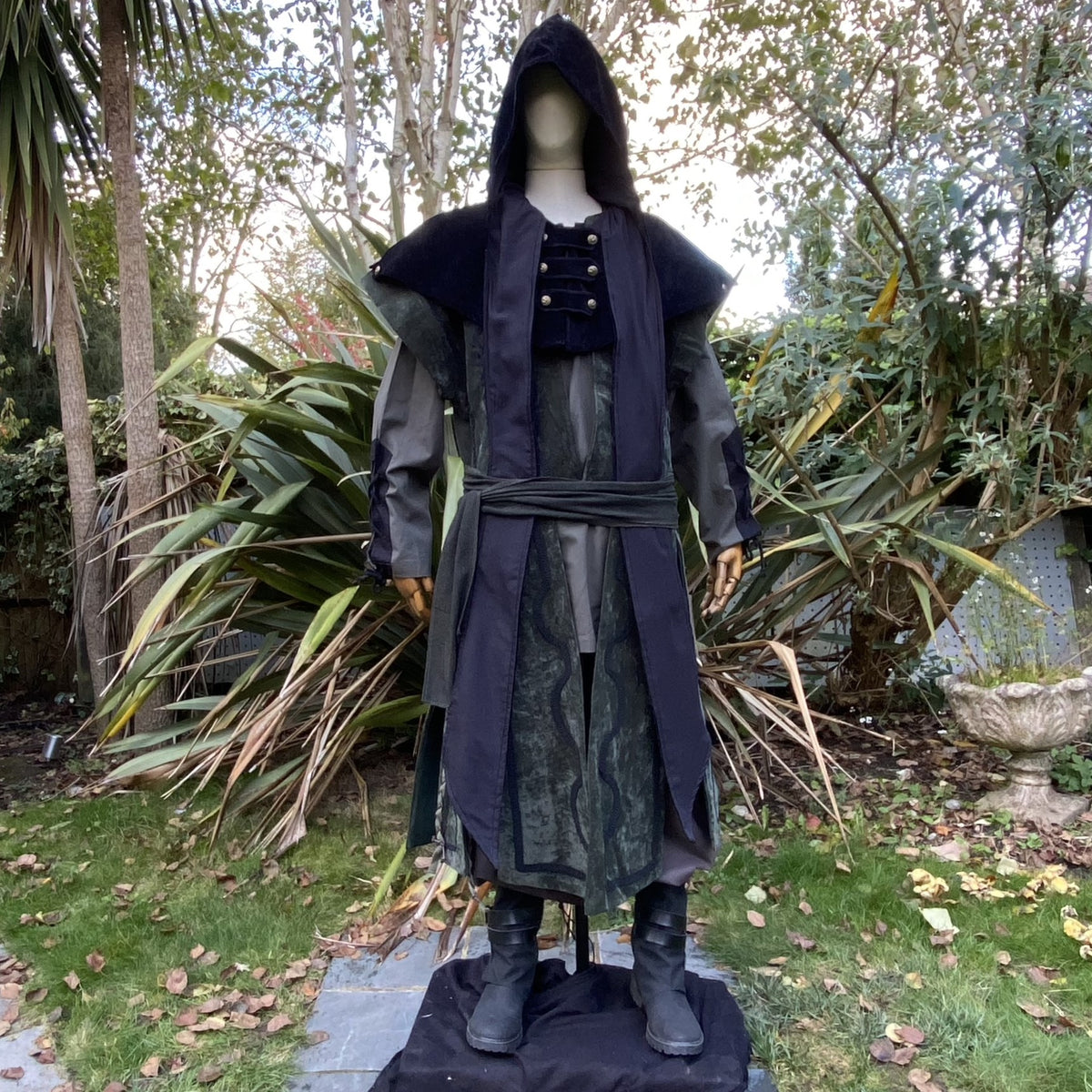 Green fantasy waistcoat with panelled design and dynamic movement for cosplay or LARP characters.
