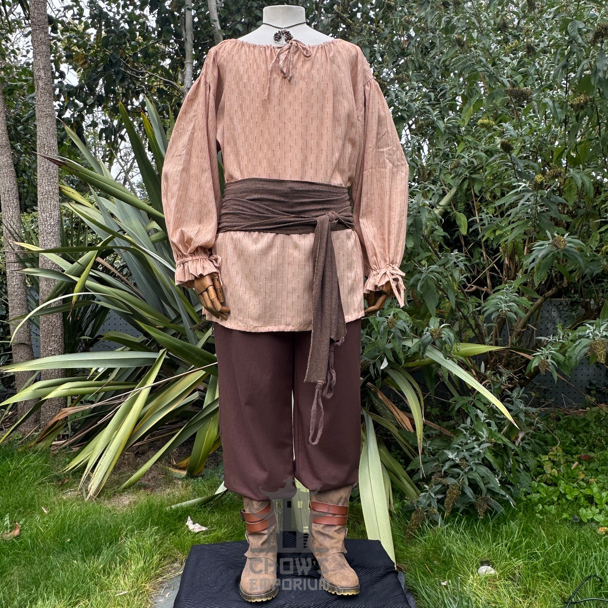 Tan cotton medieval-style shirt with round neck.