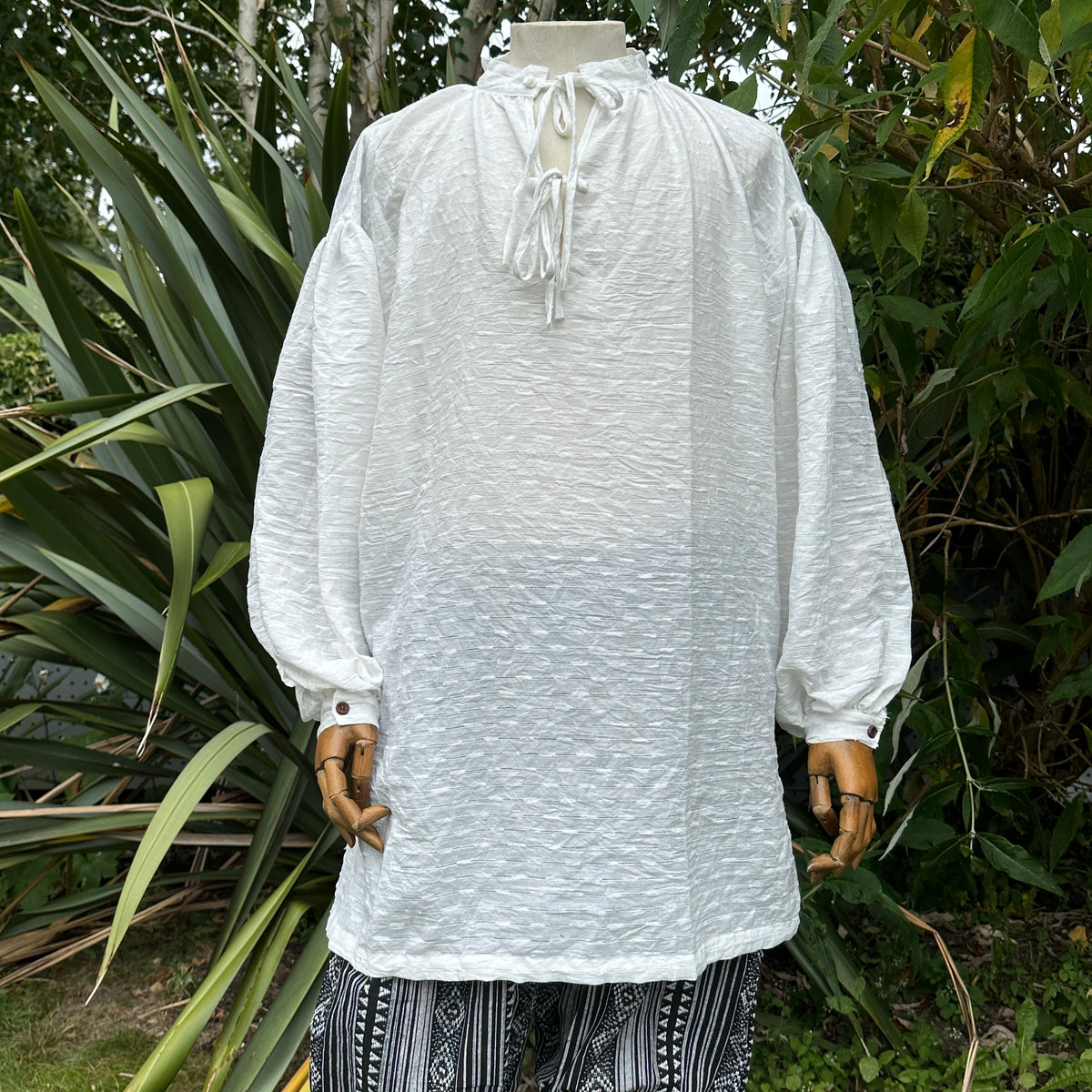 White medieval shirt with tie strings, long sleeves, front view, LARP outfit.