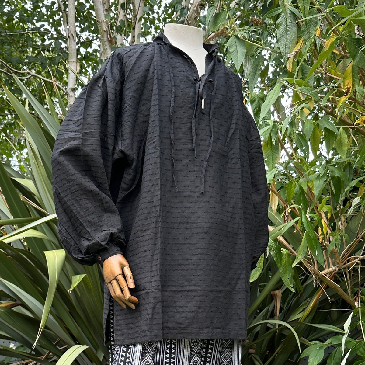 textured black medieval shirt.