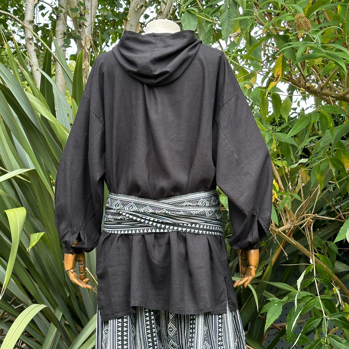 Black and white pirate sash in patterned fabric for LARP costume, rear view.