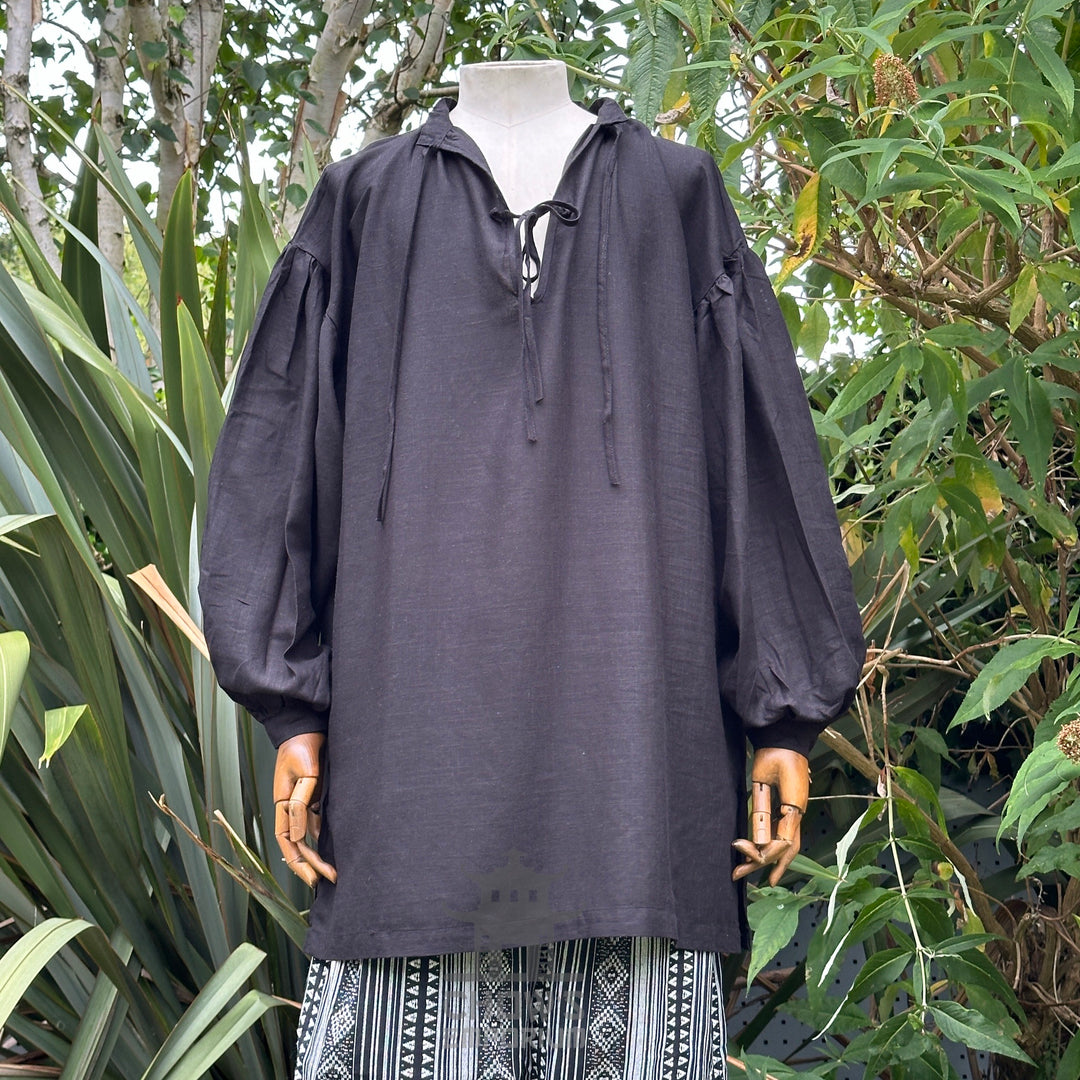 Black LARP shirt with long sleeves and tie neck, displayed on a mannequin.