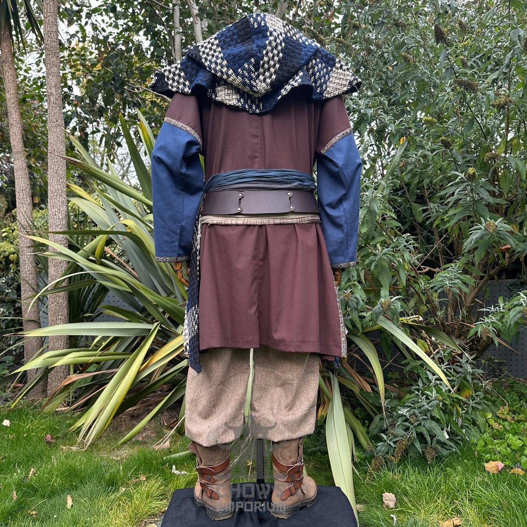 Medieval LARP outfit back view, featuring a brown and blue tunic, hood, trousers, and sash.