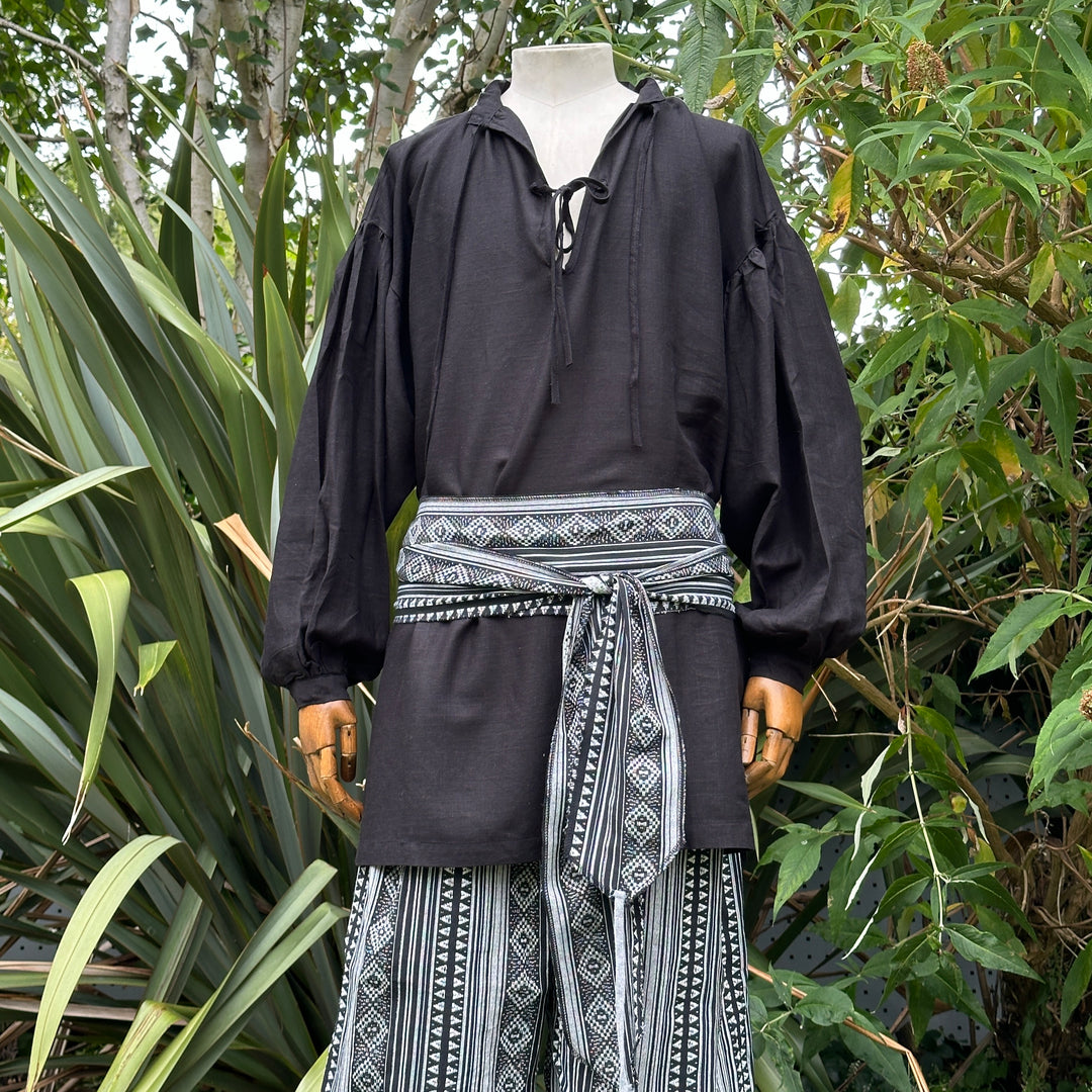 Medieval LARP outfit with black tunic, tied sash, front.