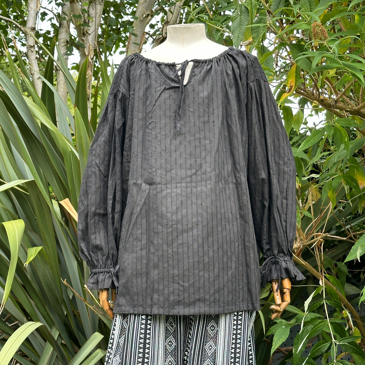 Black cotton medieval shirt with round neck, front view, LARP-ready garment.