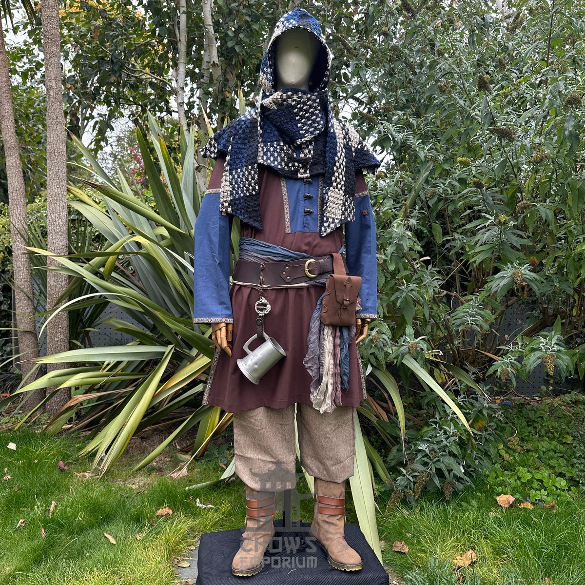 Brown and blue medieval LARP outfit with tunic, hood, trousers, and sash.