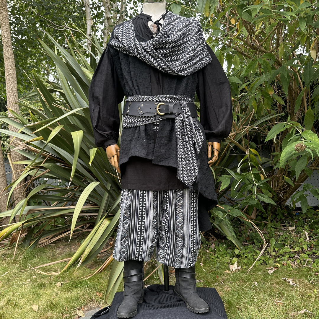 LARP pirate waistcoat and sash, angled garden view, detailed black white pattern.