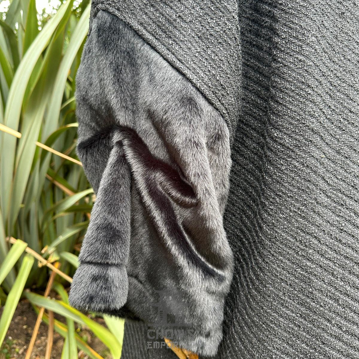 Dark grey LARP robe sleeve with textured fabric and faux fur detail.