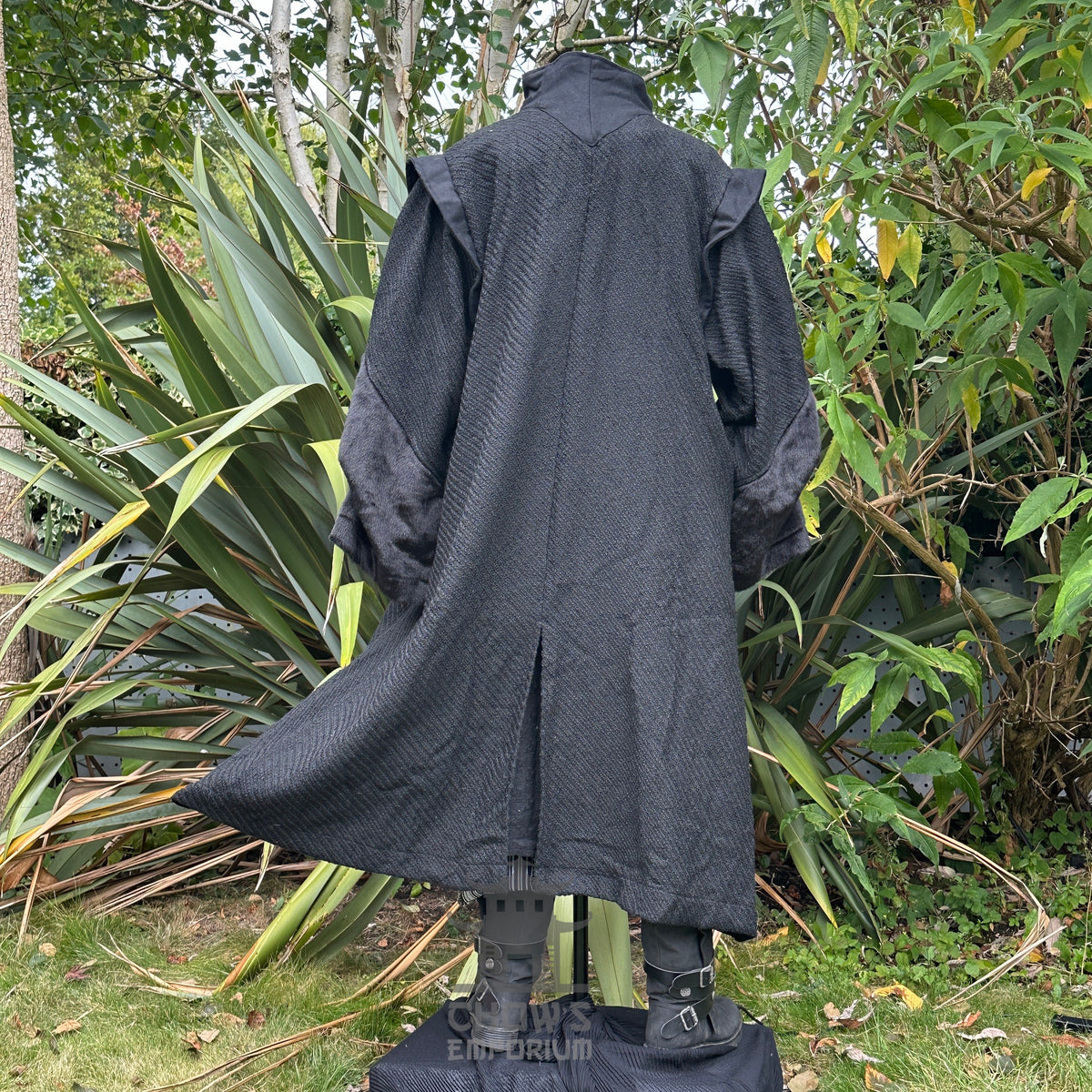 Black textured medieval LARP cape and robe, rear view with lush.