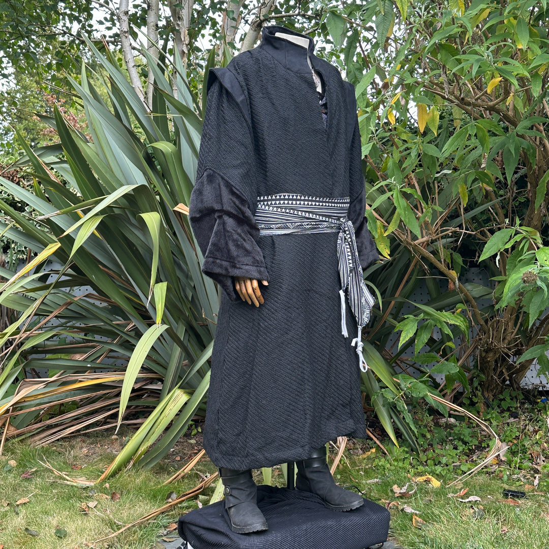Side view of black wool LARP robe with high collar, medieval fantasy cosplay costume for.