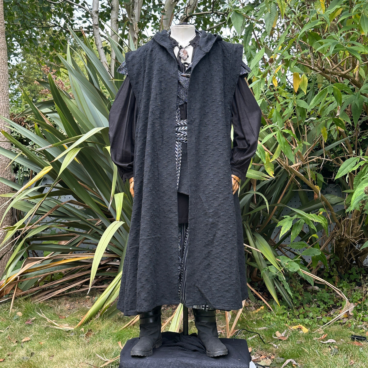 Black wool high-collar LARP robe styled over medieval outfit, fantasy cosplay costume for.
