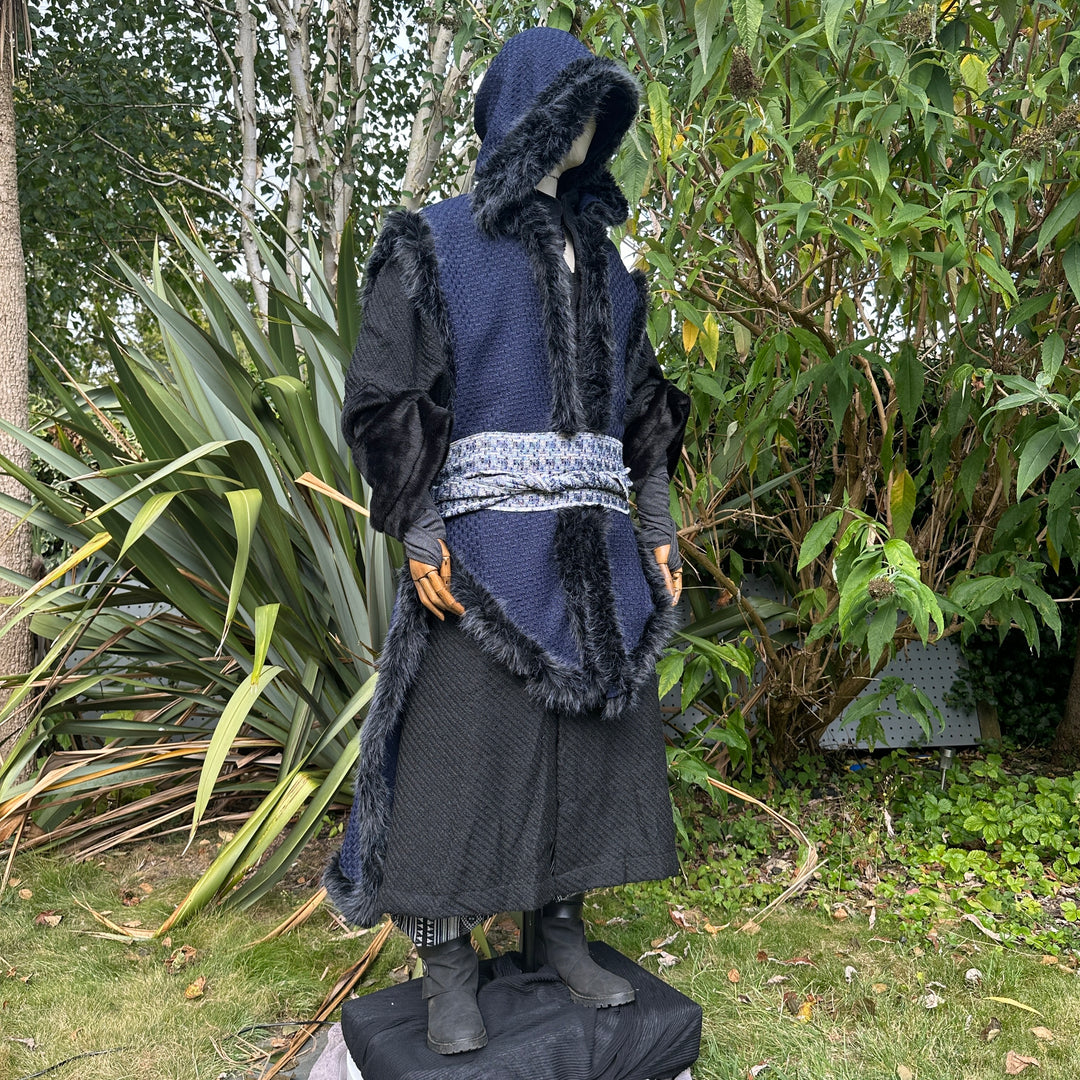 Angled front view of Viking-style blue and black LARP cape, medieval fantasy cosplay costume.