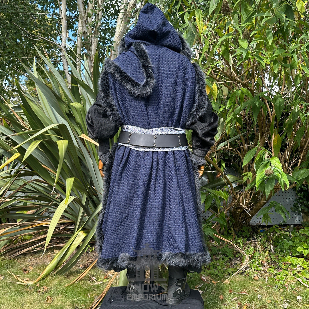 Back view of LARP medieval outfit; blue cape, fur trim, and leather belt.