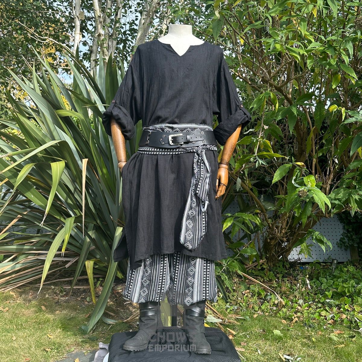Black medieval tunic with textured cotton, front view.