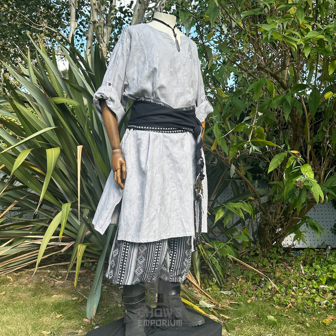 Medieval tunic in light grey textured cotton, side angle, LARP attire.
