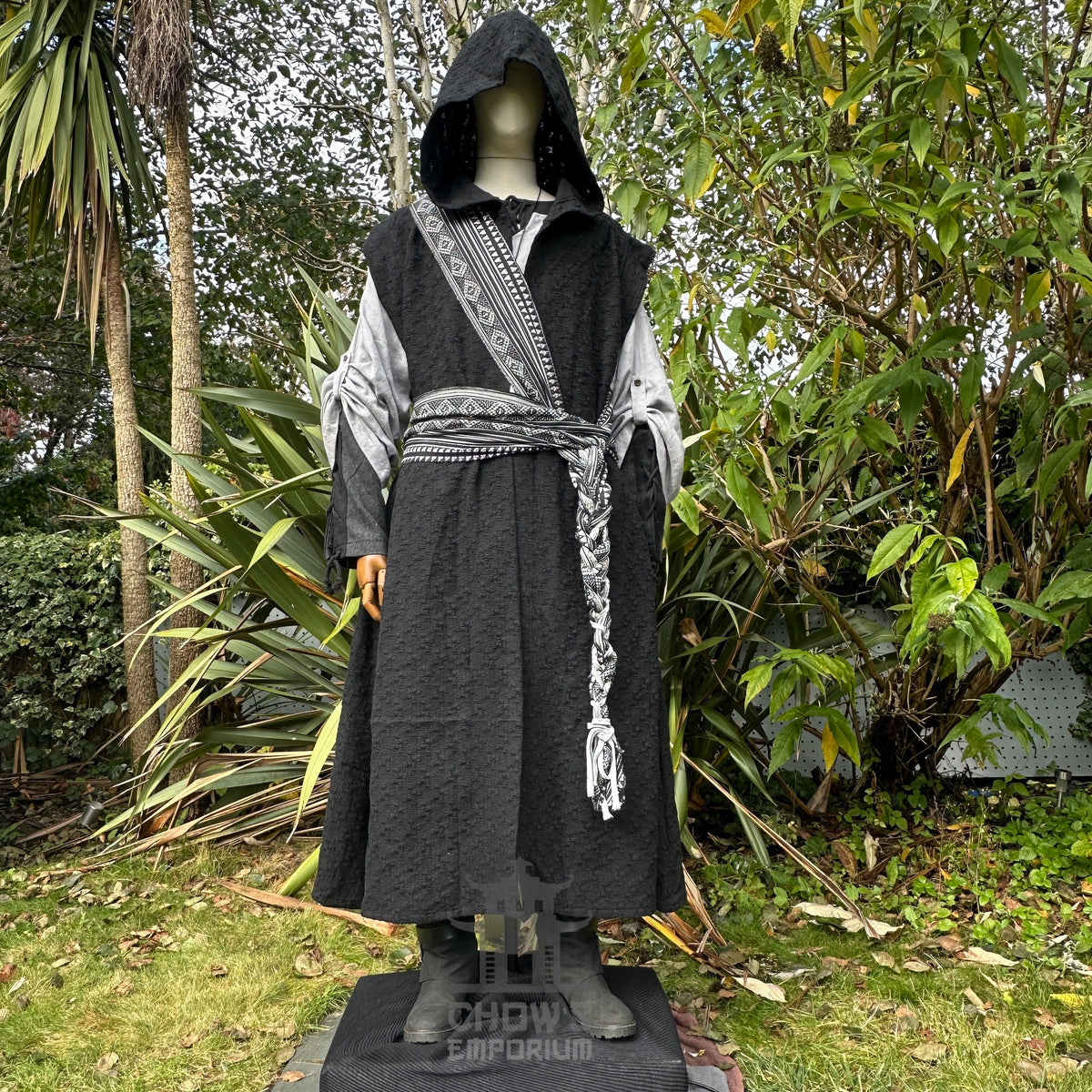 Mannequin with black hooded robe and silver accents, LARP medieval setting.