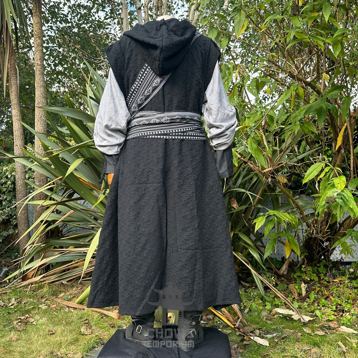 Back view of black sleeveless medieval LARP robe, fantasy cosplay costume with hood and flowing.