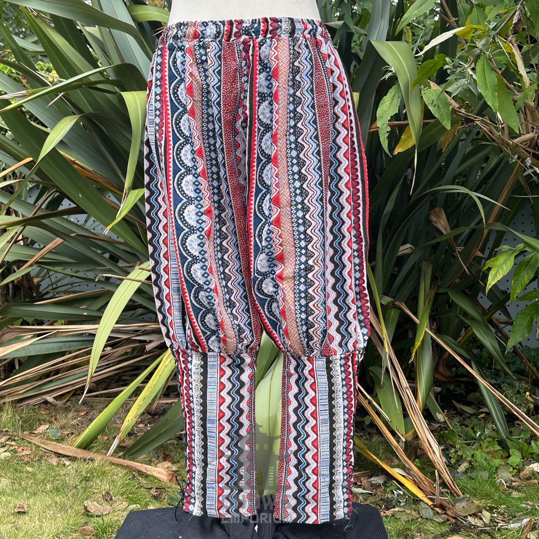 Nordic zigzag cotton Viking pants in red, black, and white for LARP.