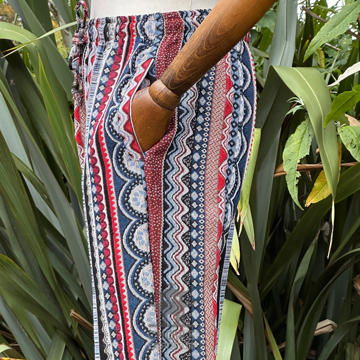 Nordic zigzag cotton medieval pants in red and blue, side view for LARP.