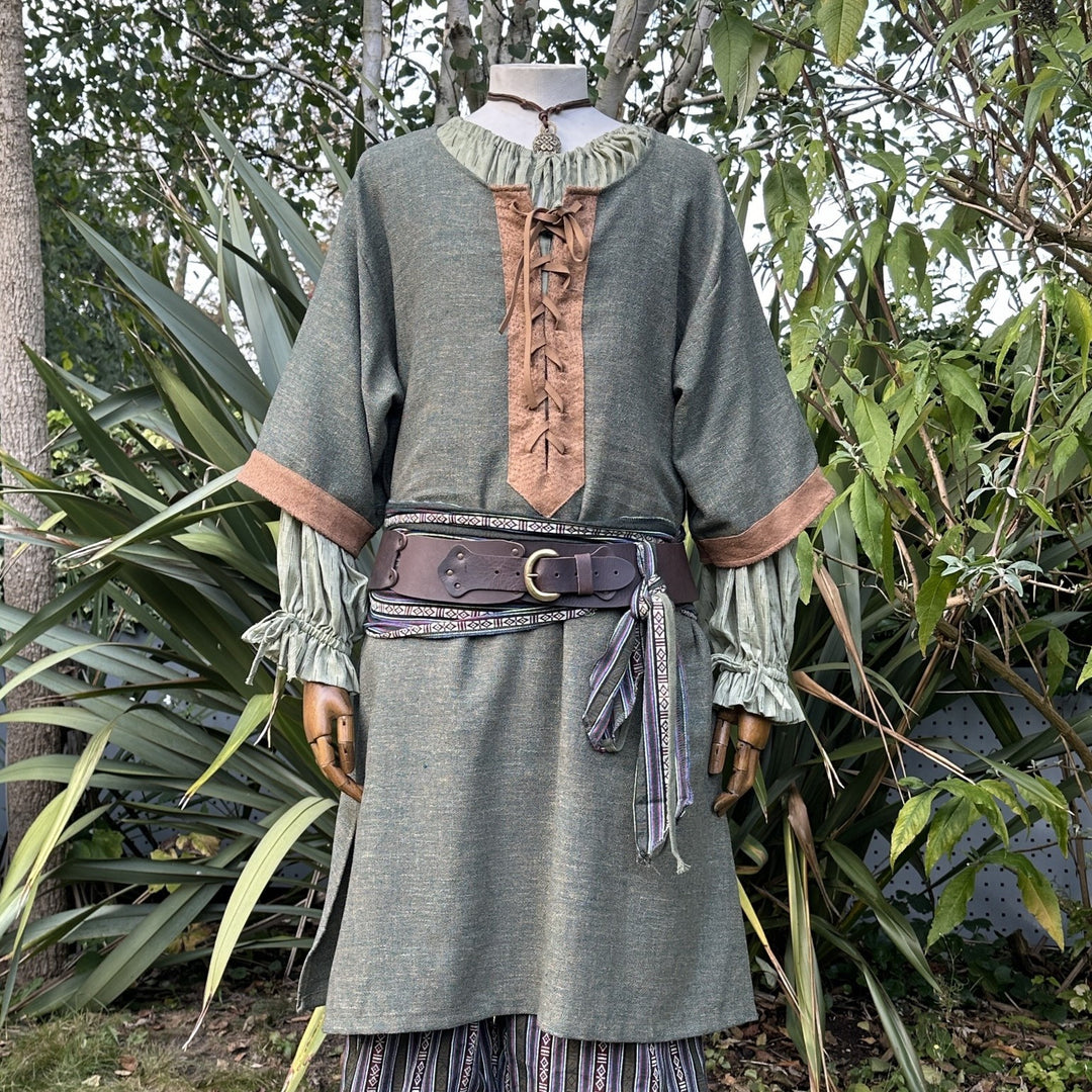 Green and brown woven medieval tunic, front view.