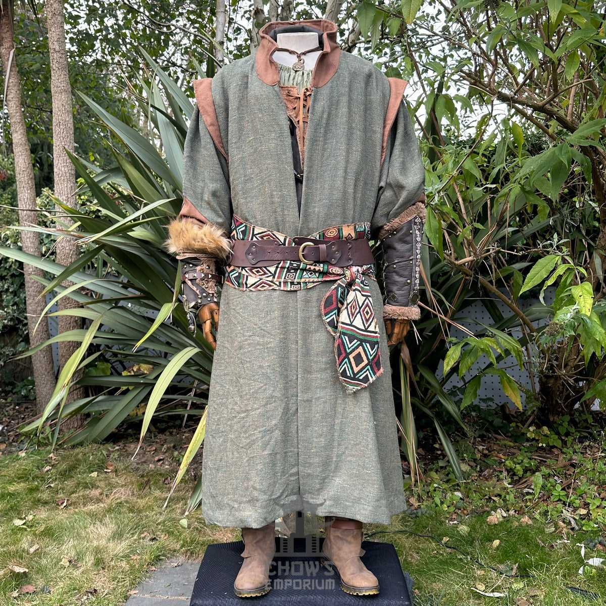 Medieval LARP robe with patterned belt, forest backdrop, front view.