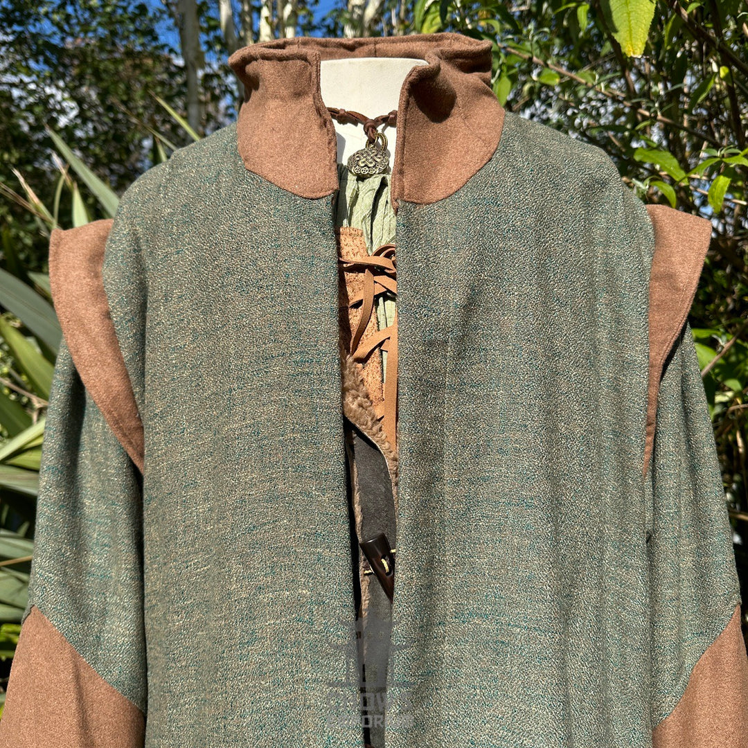 Close-up of contrasting brown collar and textured green wool fabric on high-collar medieval LARP.