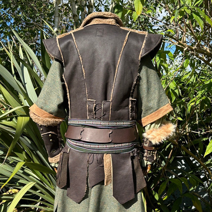 Back view of brown LARP waistcoat with wool panels and rustic fantasy styling.