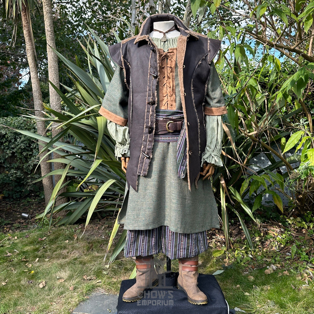 Medieval LARP ranger outfit with hooded waistcoat, earthy tones.